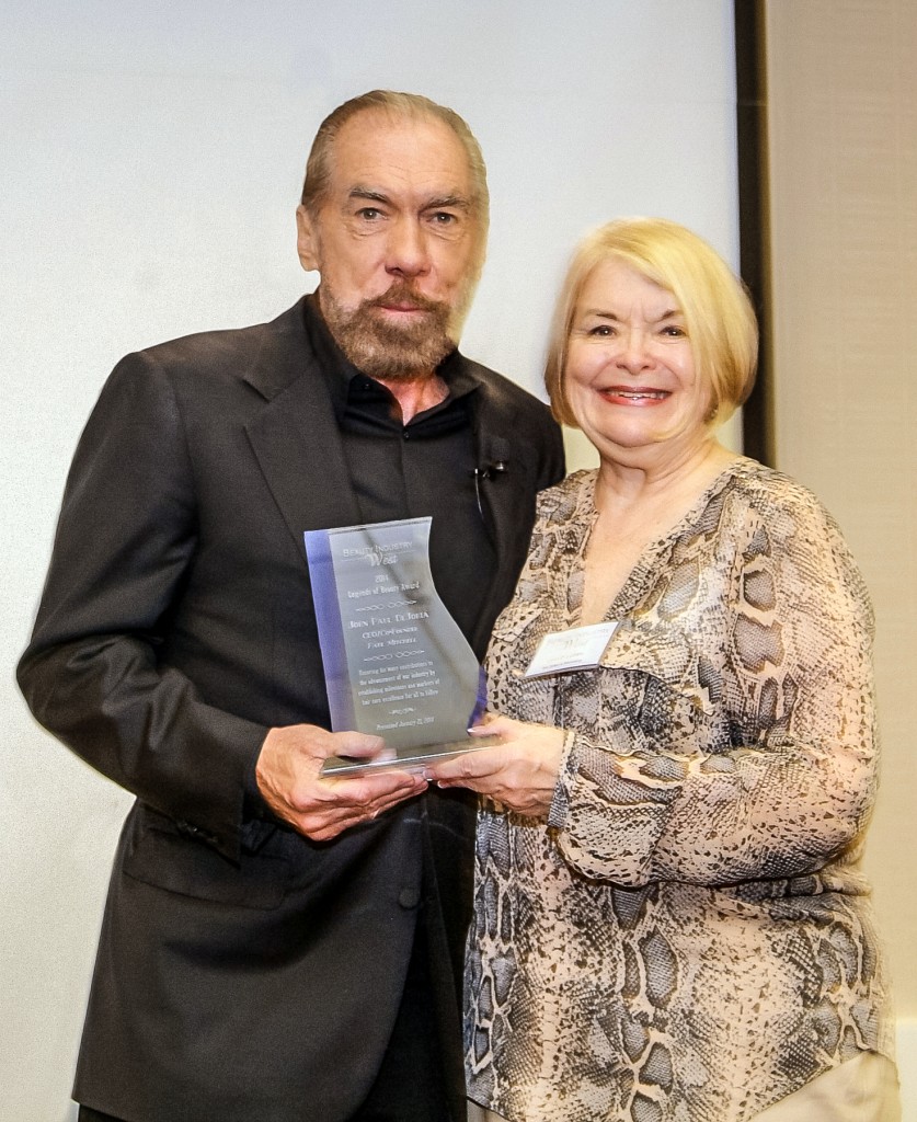 John Paul DeJoria (Co-Founder of Paul Mitchell Hair Care) accepting the BIW 2014 Legend of Beauty Award from Lynn Ludlam (Former President of BIW). 